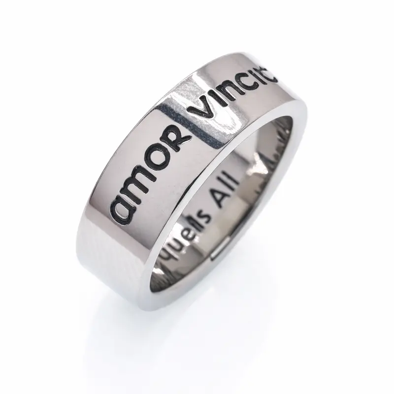 Inspirational 'Love Conquers All' Ring In Rhodium-Plated Stainless Steel 1
